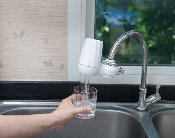 Technician installing RO water purifier